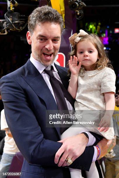 Pau Gasol and Elisabet Gianna Gasol attend a basketball game between the Los Angeles Lakers and the Memphis Grizzlies at Crypto.com Arena on March...