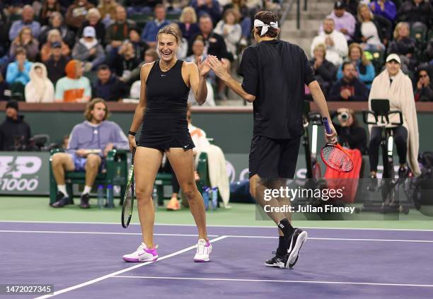 Aryna Sabalenka and Taylor Fritz of USA in the Eisenhower Cup after taking the Tie Break Tens title during the BNP Paribas Open on March 07, 2023 in...