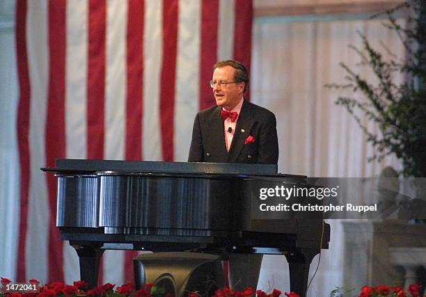 Political Satirist Mark Russell speaks during the 18th Annual Borton, Petrini & Conron, LLP's Bakersfield Business Conference on October 12, 2002 in...