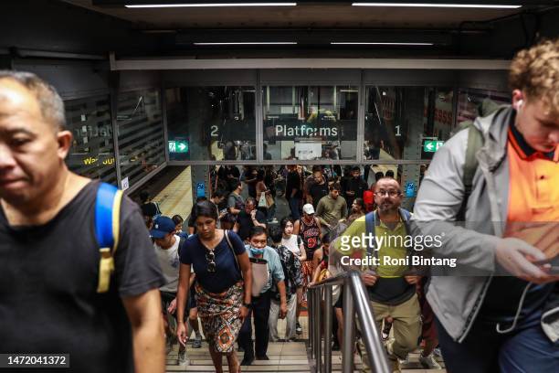Commuters are seen at Town Hall Station on March 08, 2023 in Sydney, Australia. Sydney trains ground to a halt shortly before the afternoon peak due...