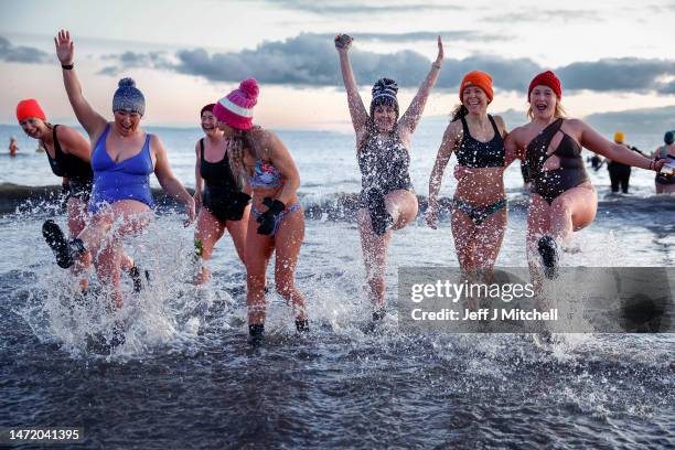 Hundreds of swimmers took a sunrise dip in the North Sea at Portobello Beach, for the International Women’s Day on March 08, 2023 in Edinburgh,...