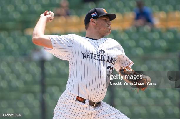 Tom De Blok of Team Netherlands pitchs at the top of the first inning during the World Baseball Classic Pool A game between Cuba and Netherlands at...