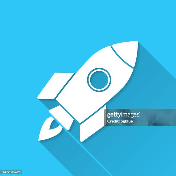 rocket. icon on blue background - flat design with long shadow - space rocket 3d stock illustrations