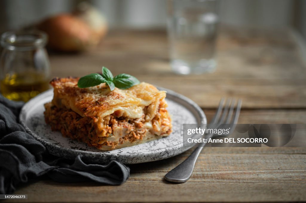 Meat and vegetable lasagna with basil