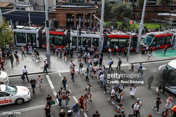 Commuters wait outside Central Station on March 08, 2023 in Sydney, Australia. Sydney trains ground to a halt shortly before the afternoon peak due...