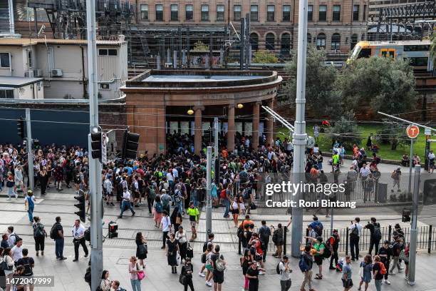 Commuters wait outside Central Station on March 08, 2023 in Sydney, Australia. Sydney trains ground to a halt shortly before the afternoon peak due...