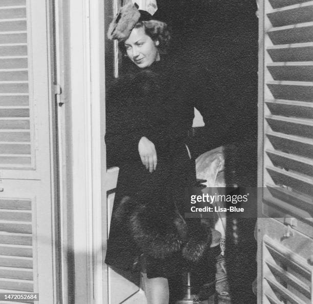 beautiful young woman on balcony. 1939. - 1930 1939 stockfoto's en -beelden