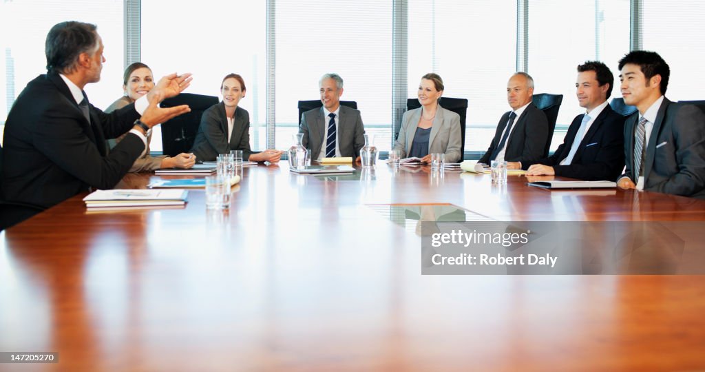 Business people meeting at table in conference room