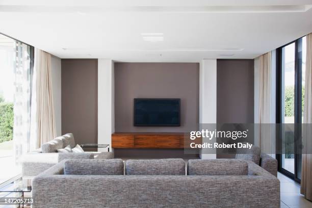 living room in modern house - living room tv stock pictures, royalty-free photos & images