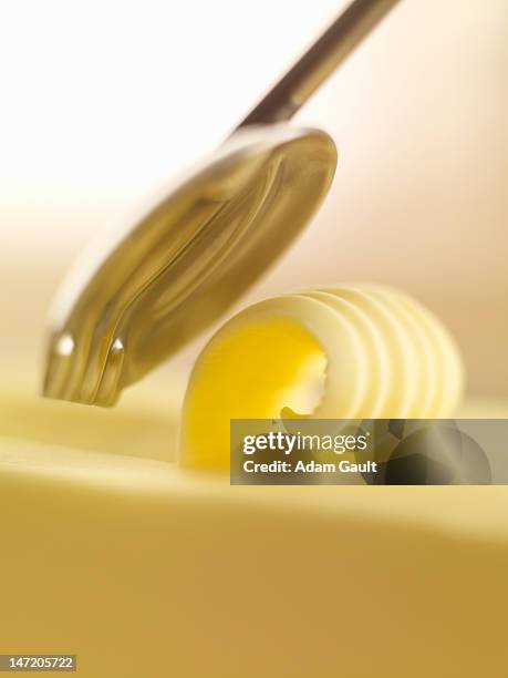 close up of butter curl - ricciolo di burro foto e immagini stock