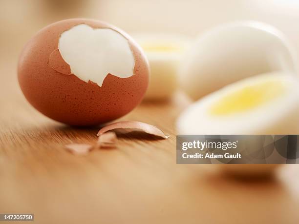 hard-boiled brown eggs - hard boiled eggs stock pictures, royalty-free photos & images