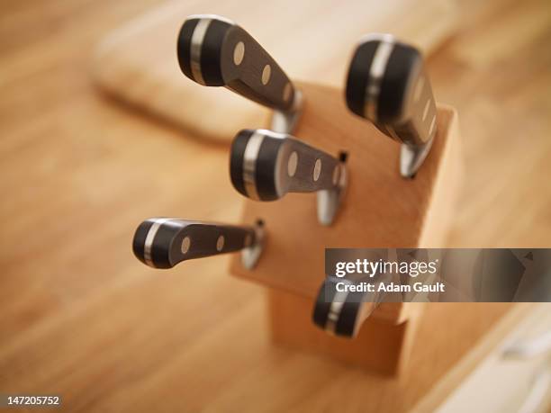 high angle view, of knives in butcher block - knife block stock-fotos und bilder