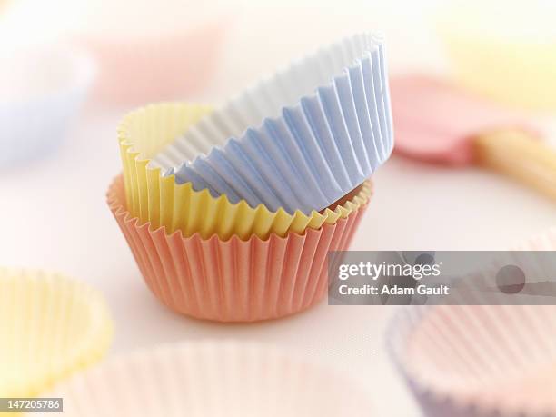 close up of pastel cupcake holders - formine foto e immagini stock