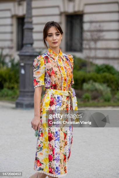 Actress Denise Tantucci wears yellow red purple striped skirt with floral print, button up blouse outside Zimmermann during Paris Fashion Week -...