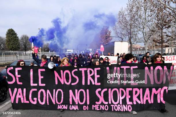 Women protest against layoffs of women at the Iveco industrial vehicle factory on March 8, 2023 in Turin, Italy. International Women's Day has been...