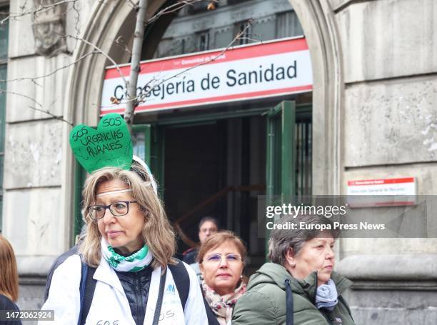 Woman dressed in a white coat during a demonstration by primary care doctors and pediatricians in the center of Madrid on March 8 in Madrid, Spain....