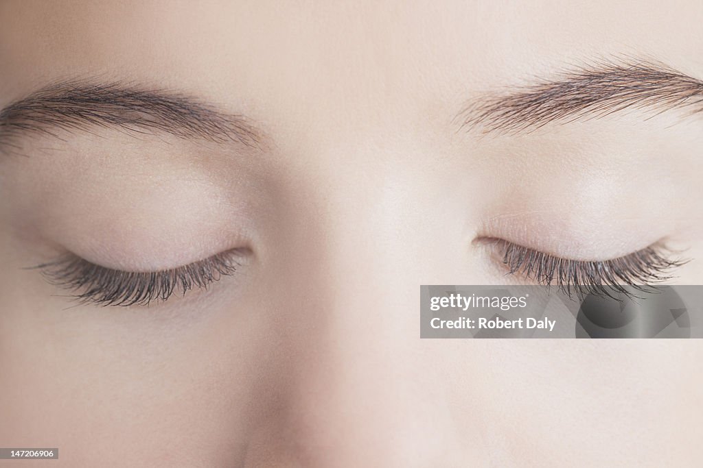 Close up of woman with eyes closed