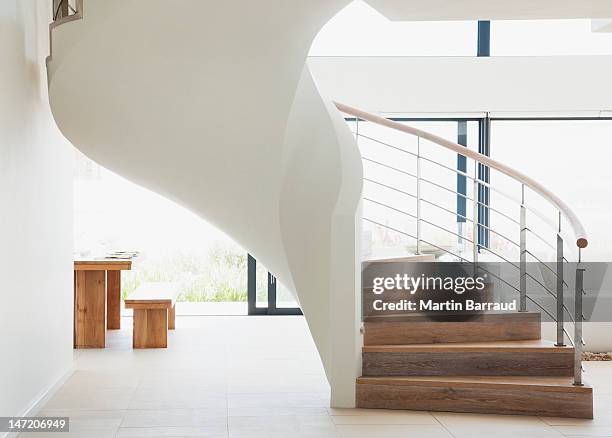 curving staircase in modern home - modern house stock pictures, royalty-free photos & images