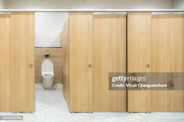 public toilet - toilet door stock pictures, royalty-free photos & images