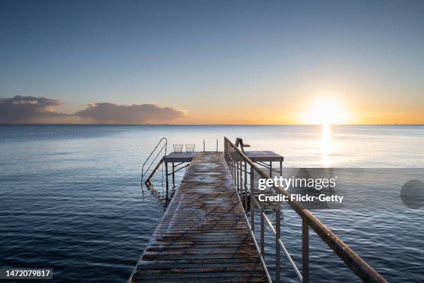 sunrise late winter - nordic sunrise stock pictures, royalty-free photos & images