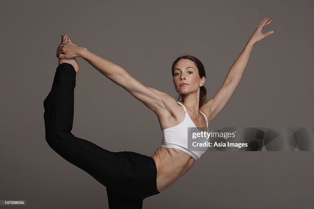 Woman doing yoga.