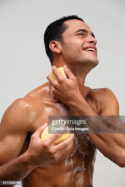 man in the shower - shower man woman washing stock pictures, royalty-free photos & images