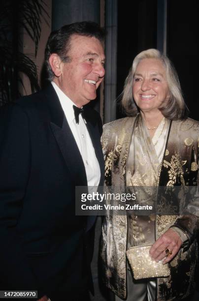 Mike Connors and wife Marylou Connors attend an event, United States, circa 1990s.
