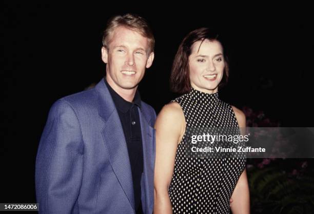 Bart Conner and Nadia Comaneci attends an event, circa 1993.