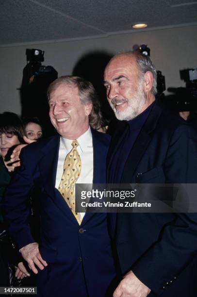 Wolfgang Peterson and Sean Connery attend the screening of "Outbreak" at Mann Bruin Theater in Westwood, California, United States, 6th March 1995.