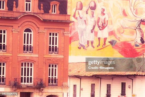 Mural in an old building in the historic district La Candelaria in Bogota, Colombia, in the 80s.