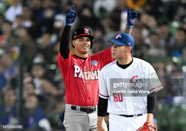 Rubén Tejada of Team Panama hits a RBI single at the top of the 6th inning during the World Baseball Classic Pool A game between Panama and Chinese...