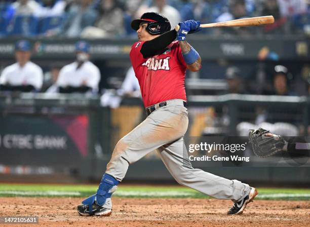 Rubén Tejada of Team Panama hits a RBI single at the top of the 6th inning during the World Baseball Classic Pool A game between Panama and Chinese...