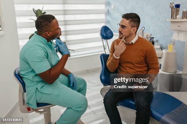 this is a sore spot - toothache stock pictures, royalty-free photos & images