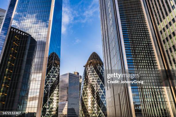 city of london office blocks - london swiss re stock pictures, royalty-free photos & images