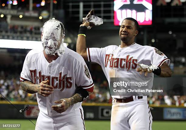 Ryan Roberts of the Arizona Diamondbacks gets a shaving cream saluate from Chris Young after Roberts hit a walk off three-run home run against the...