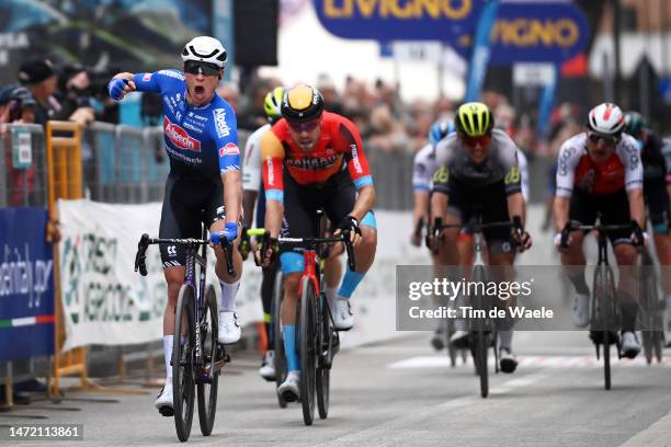 Jasper Philipsen of Belgium and Team Alpecin-Deceuninck celebrates at finish line as stage winner ahead of Phil Bauhaus of Germany and Team Bahrain...