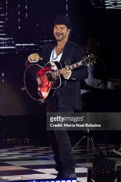 Ricardo Arjona performs on stage during a concert at Estadio Centenario de Montevideo on March 03, 2023 in Montevideo, Uruguay.