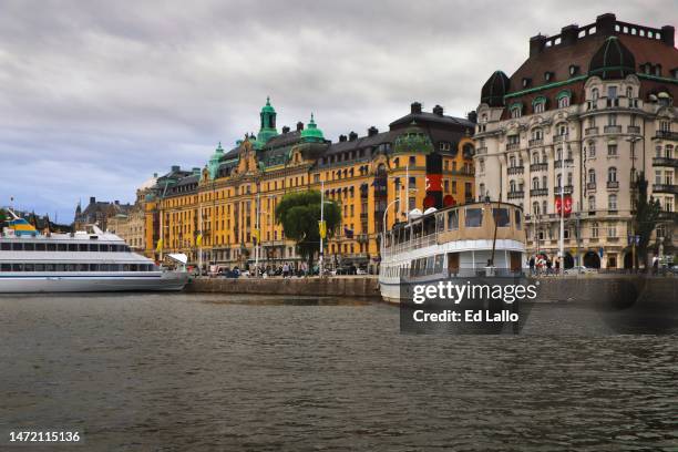 boats along stockholm strandvägen waterfront - strandvägen stock pictures, royalty-free photos & images