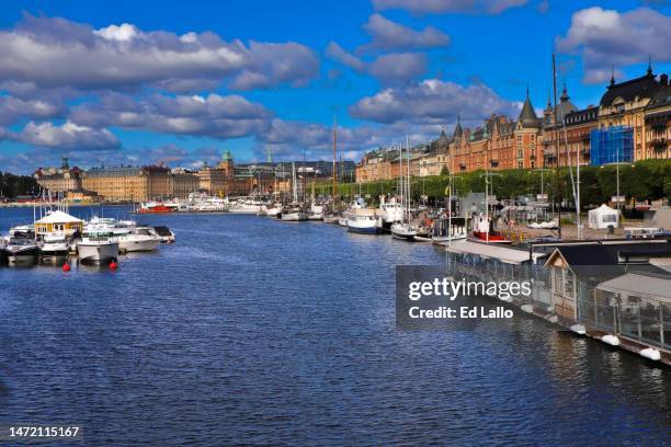 daytime stockholm strandvägen waterfront with boats and buildings - strandvägen stock pictures, royalty-free photos & images