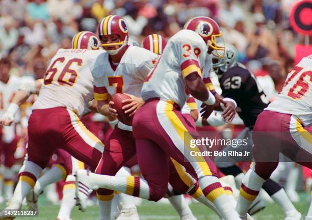 Redskins QB Joe Theismann during game between Los Angeles Raiders and Washington Redskins, August 18, 1985 in Los Angeles, California.