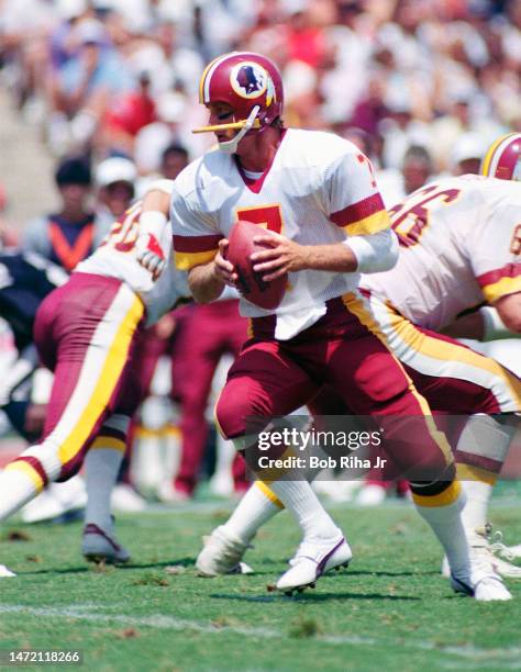 Redskins QB Joe Theismann during game between Los Angeles Raiders and Washington Redskins, August 18, 1985 in Los Angeles, California.