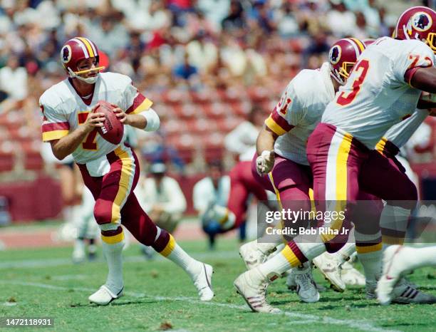 Washington Redskins QB Joe Theismann game action during game between Los Angeles Raiders and Washington Redskins, August 18, 1985 in Los Angeles,...