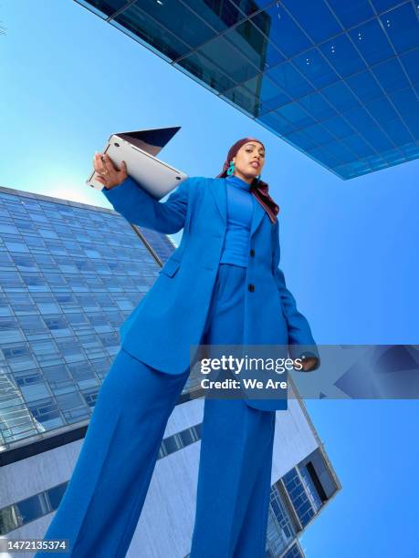 female leadership - blue suit stock pictures, royalty-free photos & images