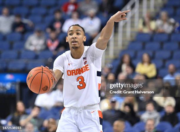 Judah Mintz of the Syracuse Orange of the Syracuse Orange directs the offense against the Wake Forest Demon Deacons during the first half of their...