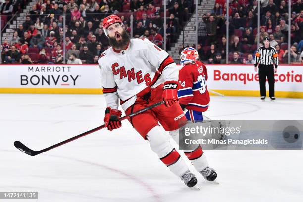 Brent Burns of the Carolina Hurricanes reacts after scoring in the shootout against the Montreal Canadiens at Centre Bell on March 7, 2023 in...