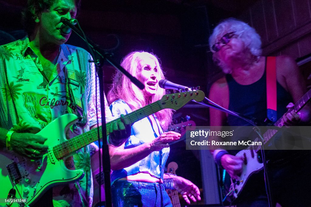 Surf Singer John Zambetti and Walter Egan of The Malibooz perform with singer and ...