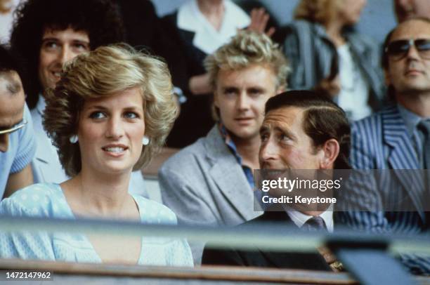 British Royals Diana, Princess of Wales, wearing a dress designed by Dale 'Kanga' Tryon, with her husband Charles, Prince of Wales, during the Live...