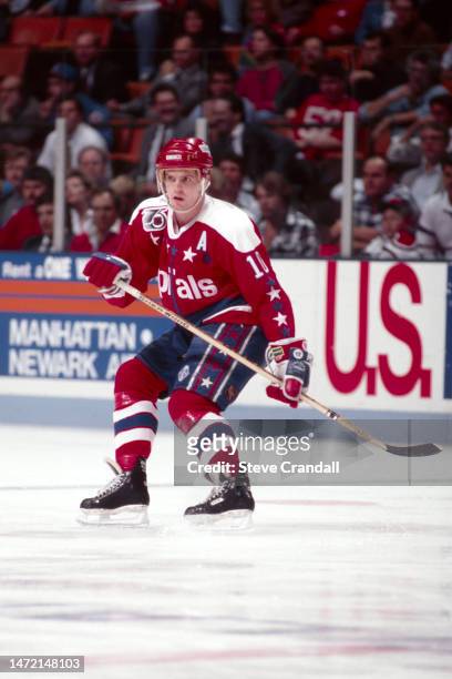 Washington Capitals forward, Kelly Miller, turns to defend at center ice during the game against the NJ Devils at the Meadowlands Arena on November...