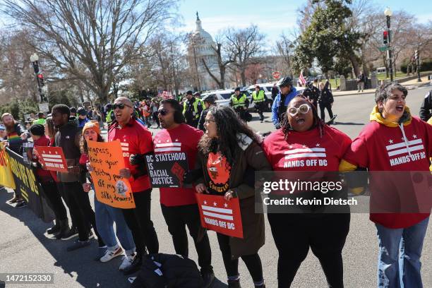Demonstrators participate in a rally for Washington, DC independence near the U.S. Capitol on March 08, 2023 in Washington, DC. The group is...