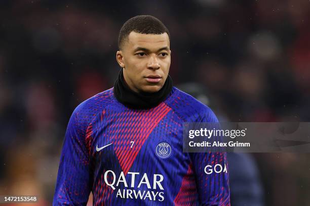 Kylian Mbappe of Paris Saint-Germain warms up prior to the UEFA Champions League round of 16 leg two match between FC Bayern München and Paris...